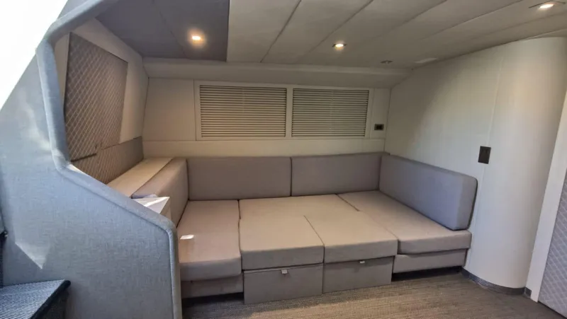  Yacht Photos Pics Interior of 1998 Otam 55 Millenium yacht with modern gray seating area.