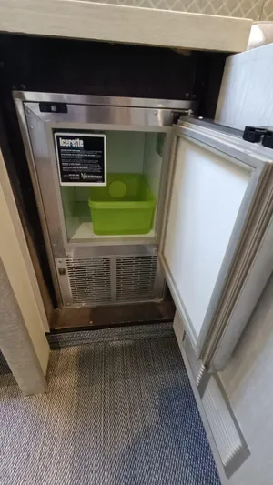  Yacht Photos Pics Small refrigerator with open door on Otam 55 Millenium yacht, 1998 model.