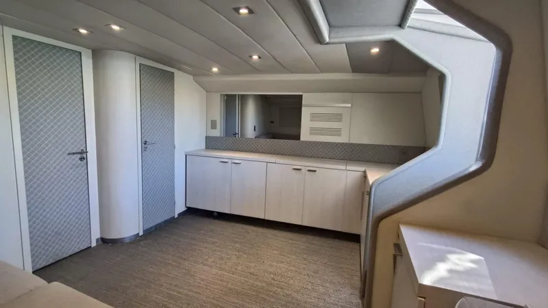  Yacht Photos Pics Interior of 1998 Otam 55 Millenium yacht, featuring modern design and sleek cabinetry.