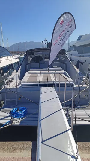  Yacht Photos Pics 1998 Otam 55 Millenium yacht docked, available for sale, with a visible banner.