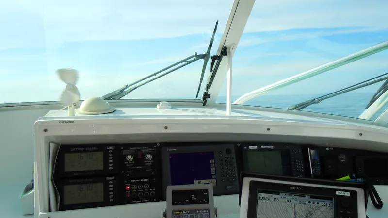 Waterproof Yacht Photos Pics Dashboard of a 2001 Davis 45 Express boat with navigation equipment.