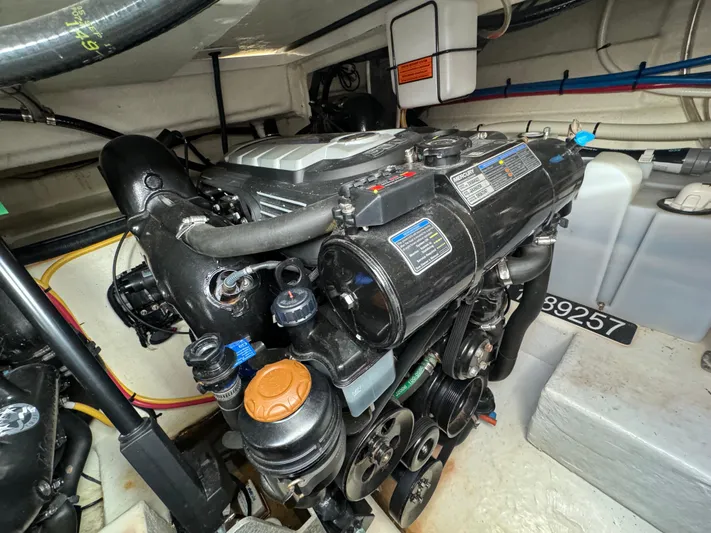Kaja Yacht Photos Pics Engine compartment of a 2018 Monterey 335 SY boat, showcasing detailed mechanical components.