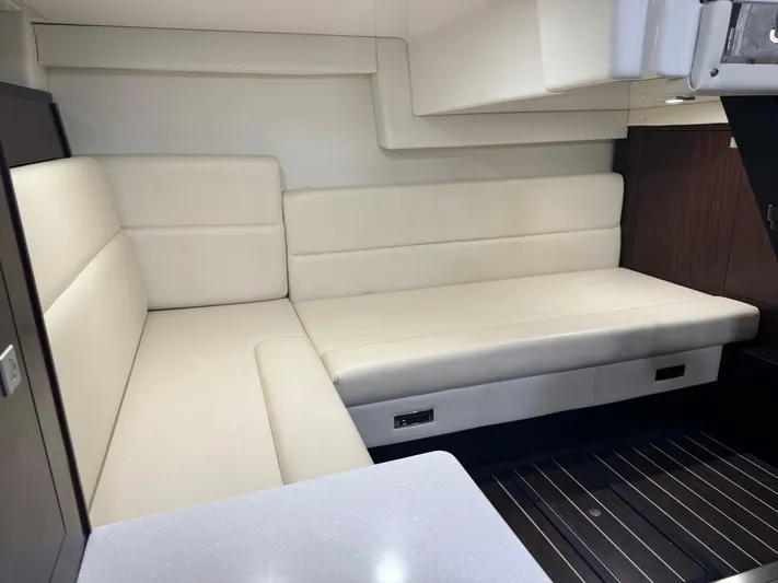 Kaja Yacht Photos Pics 2018 Monterey 335 SY interior with beige seating and modern design.