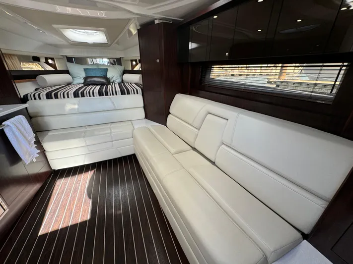 Kaja Yacht Photos Pics Luxurious interior of 2018 Monterey 335 SY yacht with elegant seating and modern design.