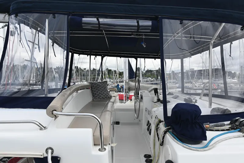  Yacht Photos Pics Lagoon 440 catamaran interior with seating and steering wheel, 2009 model.
