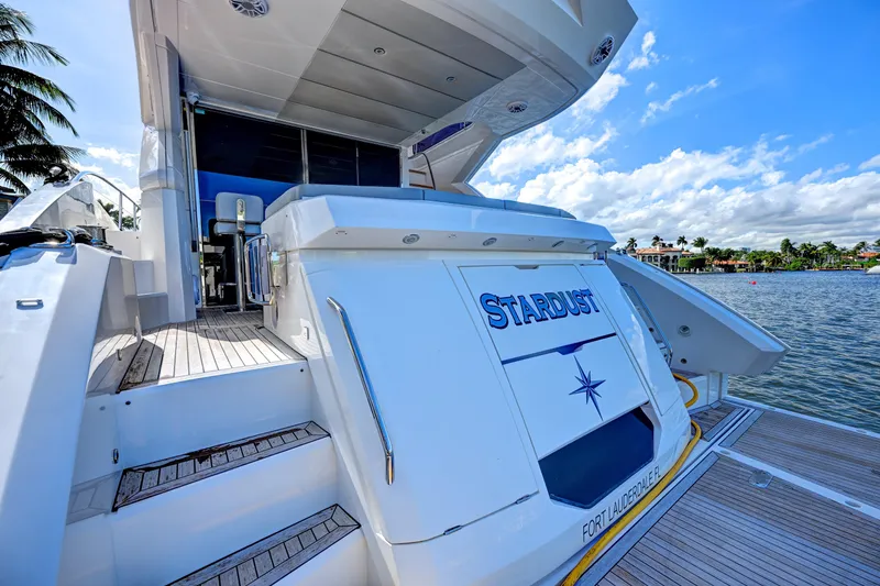  Yacht Photos Pics 2020 Sunseeker Manhattan 52 yacht docked, featuring "Stardust" nameplate, Fort Lauderdale.