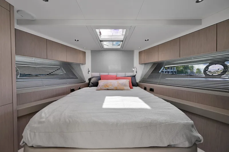  Yacht Photos Pics Luxurious bedroom interior of 2020 Sunseeker Manhattan 52 yacht with modern design.