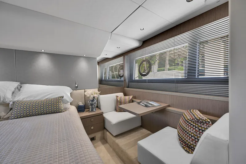  Yacht Photos Pics Luxurious interior of 2020 Sunseeker Manhattan 52 yacht with elegant seating and decor.