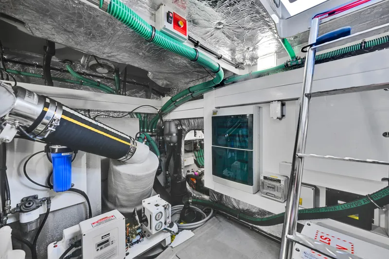  Yacht Photos Pics Engine room of 2020 Sunseeker Manhattan 52 yacht, featuring advanced mechanical systems.