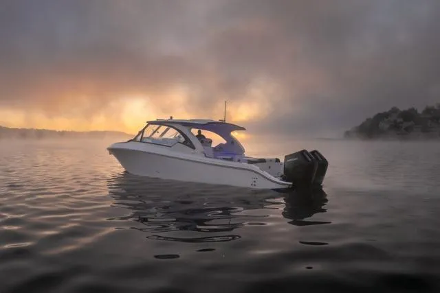  Yacht Photos Pics 2026 Fountain 39 DX boat on misty water at sunrise.