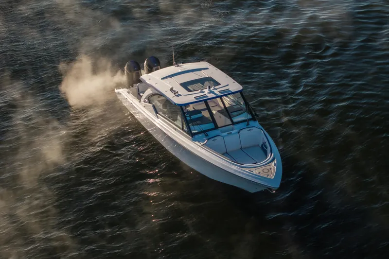  Yacht Photos Pics 2026 Fountain 39 DX boat cruising on water, aerial view.