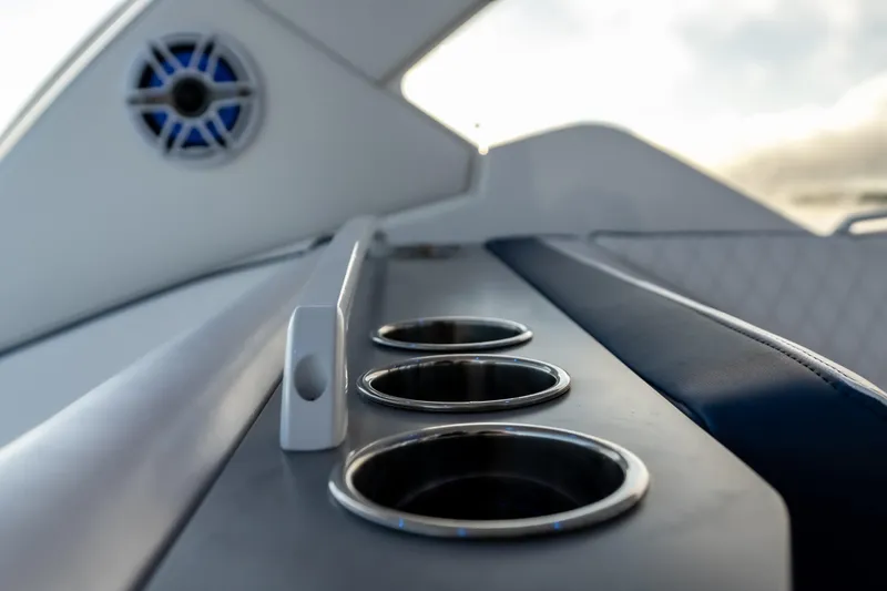  Yacht Photos Pics Interior view of 2026 Fountain 39 DX boat with cup holders and speaker.