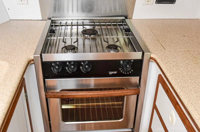 Sangaris Yacht Photos Pics Stainless steel stove and oven in 2005 Manta 42 MkII yacht kitchen.