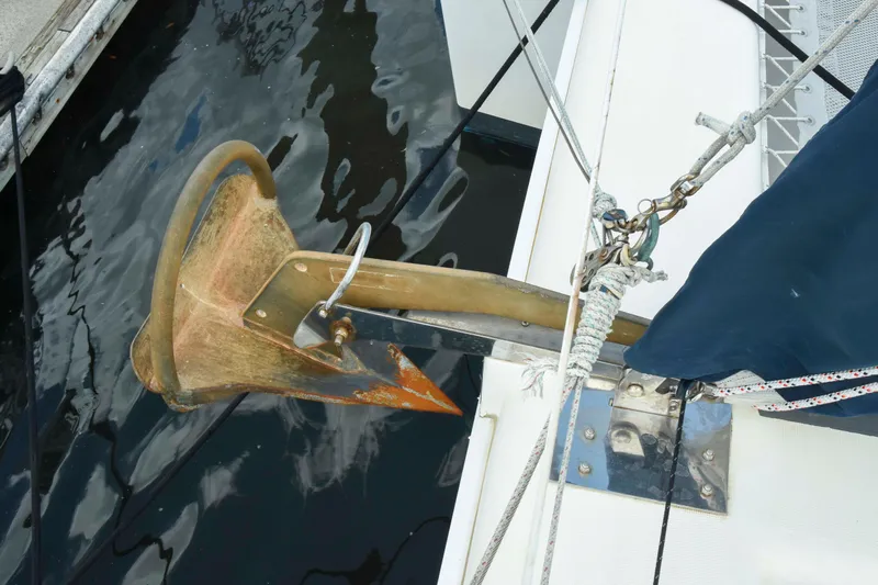 Sangaris Yacht Photos Pics Anchor on a 2005 Manta 42 MkII sailboat, docked in calm waters.