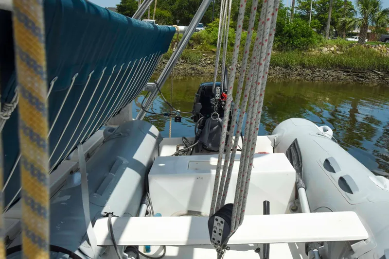 Sangaris Yacht Photos Pics 2005 Manta 42 MkII sailboat with ropes and inflatable dinghy on deck.
