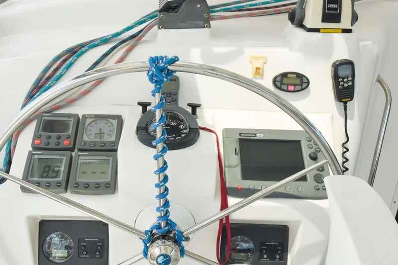 Sangaris Yacht Photos Pics Cockpit of 2005 Manta 42 MkII sailboat with navigation instruments and steering wheel.