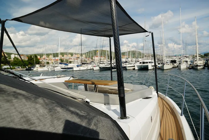  Yacht Photos Pics Sunseeker Manhattan 66 yacht, 2017 model, docked in a marina with scenic views.