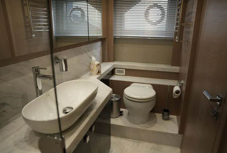  Yacht Photos Pics Luxurious bathroom in 2017 Sunseeker Manhattan 66 yacht with modern fixtures and elegant design.