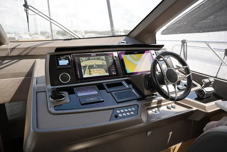  Yacht Photos Pics Helm of 2017 Sunseeker Manhattan 66 yacht with advanced navigation controls.