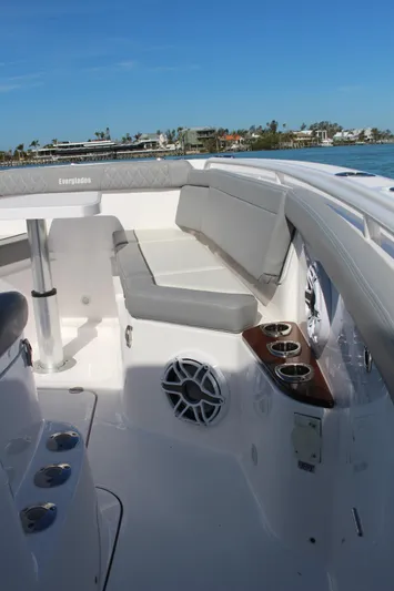  Yacht Photos Pics 2024 Everglades 395 Center Console boat with spacious seating and cup holders.