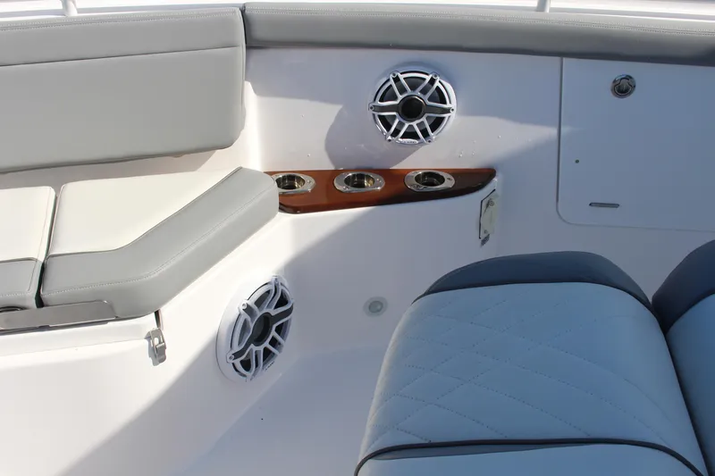  Yacht Photos Pics 2024 Everglades 395 Center Console interior with speakers and cup holders.