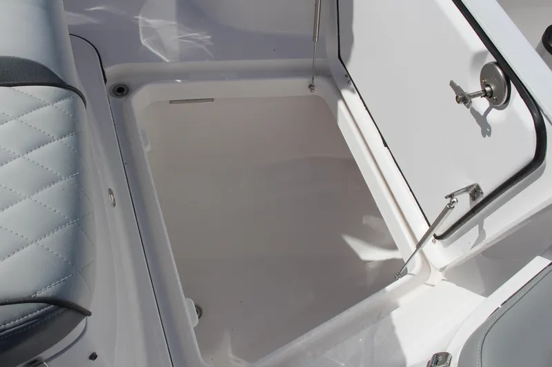  Yacht Photos Pics 2024 Everglades 395 Center Console storage compartment with open hatch.