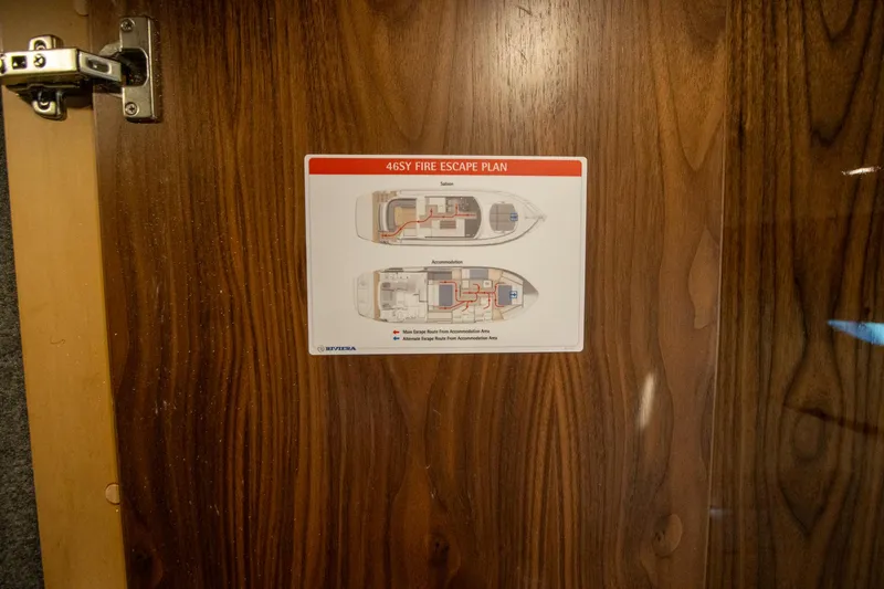  Yacht Photos Pics Fire escape plan on 2024 Riviera 4600 SY yacht door.