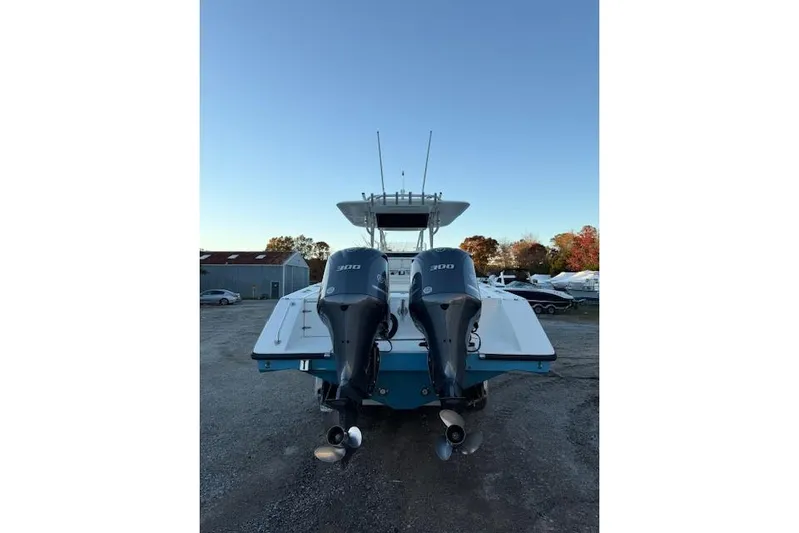  Yacht Photos Pics 2001 Venture 34 Center Console boat with dual 300 horsepower engines, rear view.