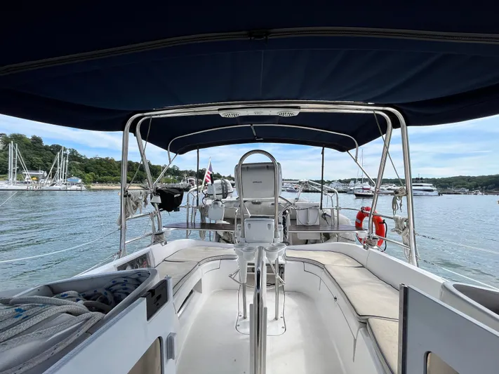 Mariah Yacht Photos Pics 2008 Hunter 41 Deck Salon sailboat with spacious cockpit and canopy on calm water.