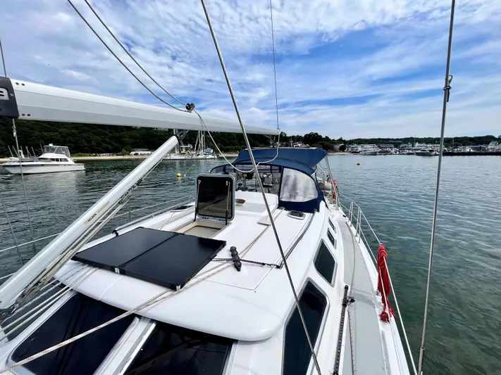 Mariah Yacht Photos Pics 2008 Hunter 41 Deck Salon sailboat on calm water with scenic background.