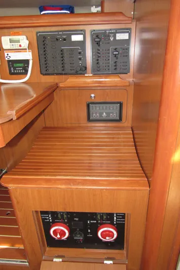 Mariah Yacht Photos Pics 2008 Hunter 41 Deck Salon interior control panel with wood finish.