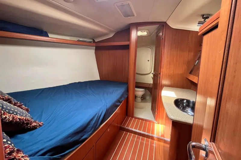 Mariah Yacht Photos Pics Interior of 2008 Hunter 41 Deck Salon with cozy cabin and wooden finish.