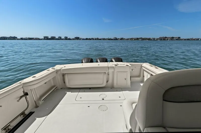  Yacht Photos Pics 2016 Grady-White Freedom 375 boat deck with ocean view and clear blue sky.
