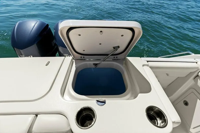  Yacht Photos Pics 2016 Grady-White Freedom 375 boat with open storage compartment and dual engines.