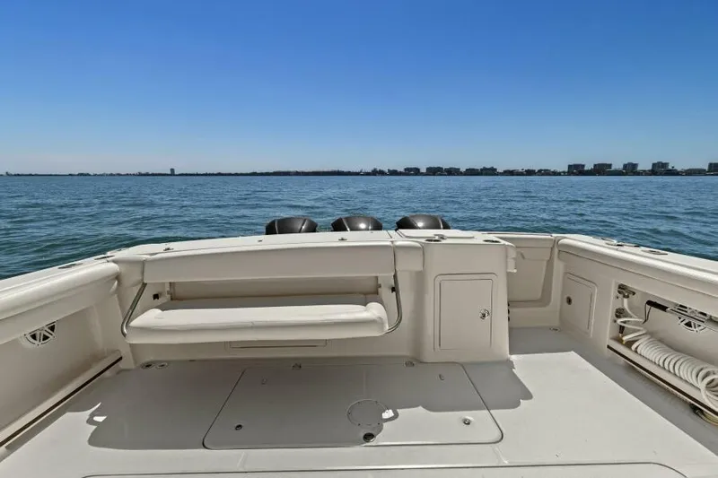  Yacht Photos Pics 2016 Grady-White Freedom 375 boat deck with ocean view and clear blue sky.