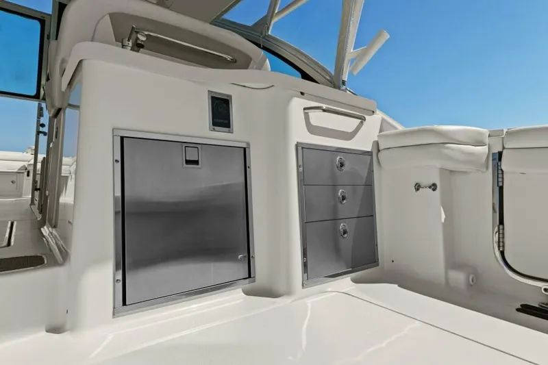  Yacht Photos Pics 2016 Grady-White Freedom 375 boat interior with storage compartments and seating.