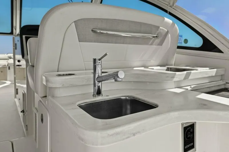  Yacht Photos Pics Luxury Grady-White Freedom 375 boat interior with sleek sink and faucet, 2016 model.