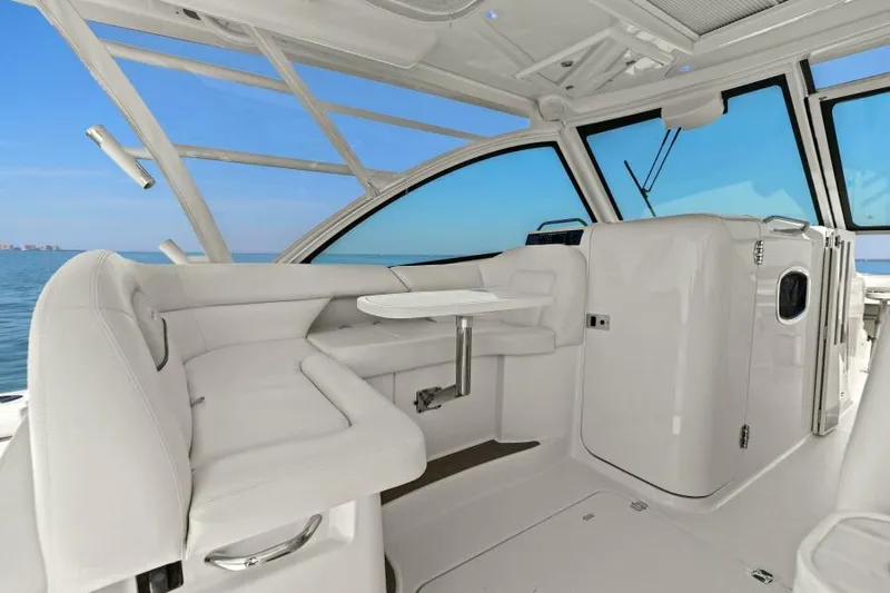  Yacht Photos Pics 2016 Grady-White Freedom 375 boat interior with white seating and ocean view.