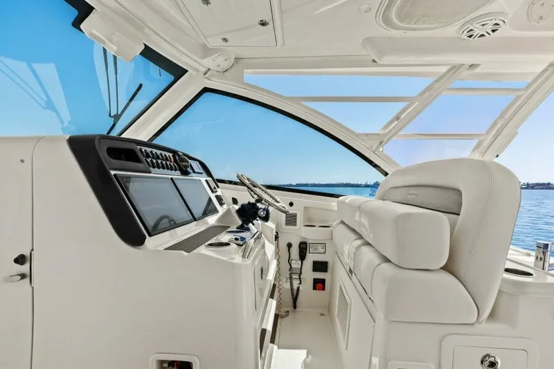  Yacht Photos Pics 2016 Grady-White Freedom 375 boat interior with modern helm and seating.
