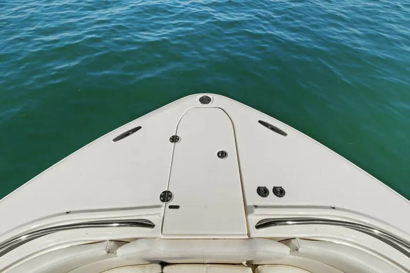  Yacht Photos Pics Bow of 2016 Grady-White Freedom 375 boat on calm blue water.