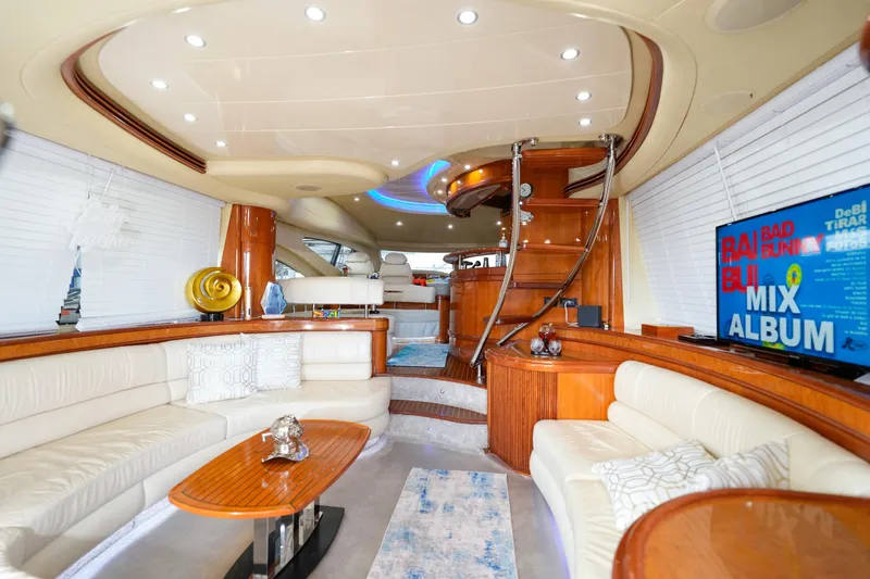 Finesse Yacht Photos Pics Luxurious interior of a 2007 Azimut 68E yacht with elegant seating and modern decor.