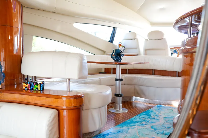 Finesse Yacht Photos Pics Luxurious interior of 2007 Azimut 68E yacht with elegant seating and decor.