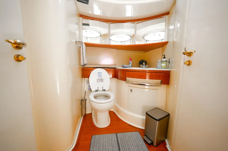 Finesse Yacht Photos Pics Luxurious bathroom in 2007 Azimut 68E yacht with modern amenities and elegant design.