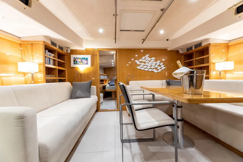  Yacht Photos Pics Luxurious interior of 2013 Hanse 630e yacht with elegant seating and dining area.