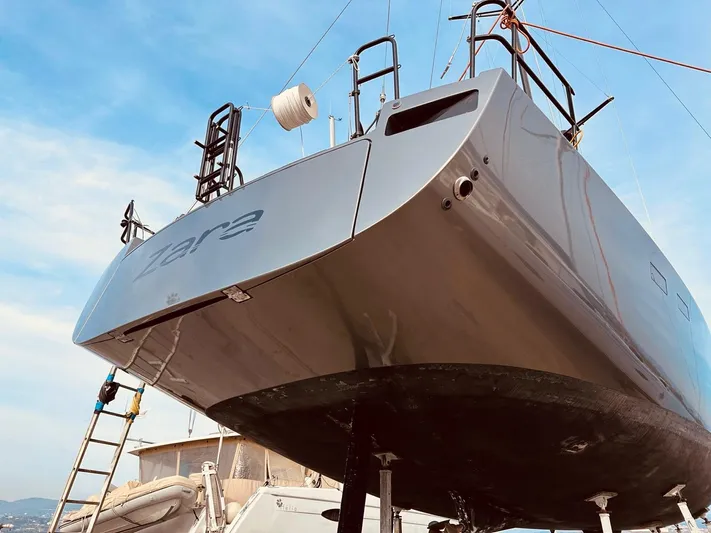  Yacht Photos Pics 2013 Hanse 630e yacht in dry dock, showcasing sleek hull design.