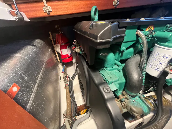 Isabelle Yacht Photos Pics Engine room of a 2016 Beneteau Swift Trawler 30 with fire extinguisher.