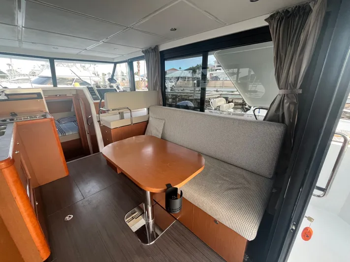 Isabelle Yacht Photos Pics Interior of 2016 Beneteau Swift Trawler 30 with cozy seating area.
