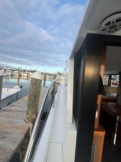 Isabelle Yacht Photos Pics Beneteau Swift Trawler 30, 2016, docked with interior view.