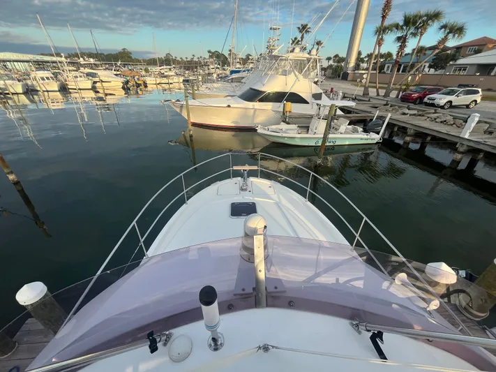 Isabelle Yacht Photos Pics Beneteau Swift Trawler 30 in harbor, 2016 model, calm water view.