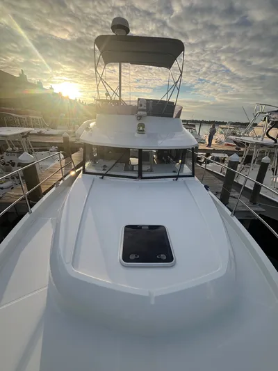 Isabelle Yacht Photos Pics Beneteau Swift Trawler 30, 2016, docked at sunset.